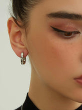 wearing Harper Square Earrings in silver